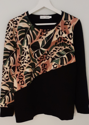 Stiilne must  pusa Monstera-tellimisel - Image 3